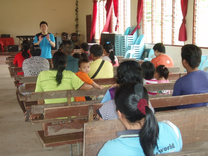 Dr. Michael Teng giving medical talk after church service