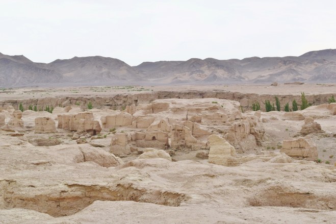 one side of the cliff/deep river valley where the trees are... with the two river valleys that form a natural defensive barrier, this city had no protective walls!